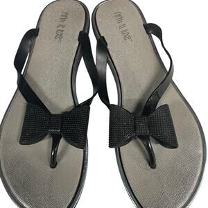Black bow flip flop sandals